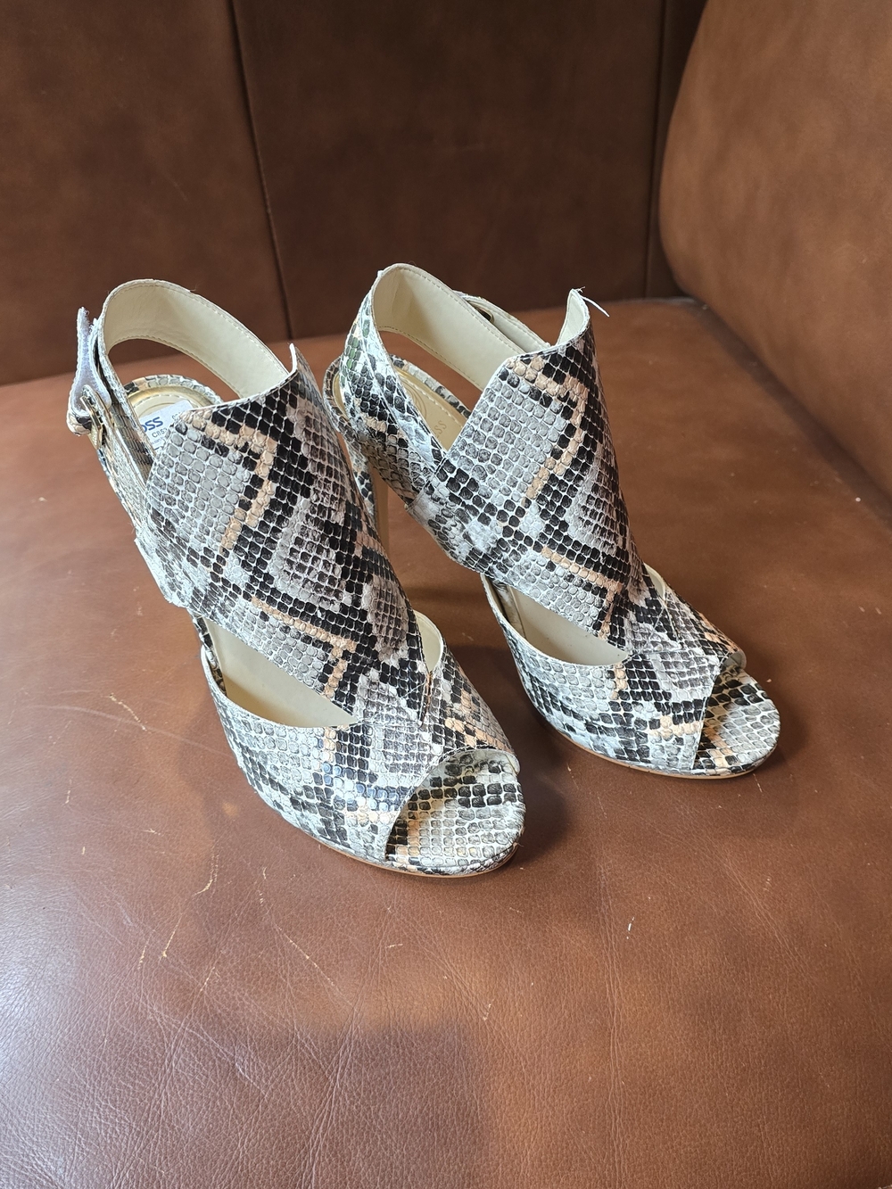 Guess Snake-Print Peep Toe Heels in Black, White, Tan